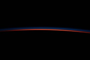 The last rays of an orbital sunset illuminate Earth's horizon in this photograph from the International Space Station as it orbited 263 miles above the African nation Botswana.