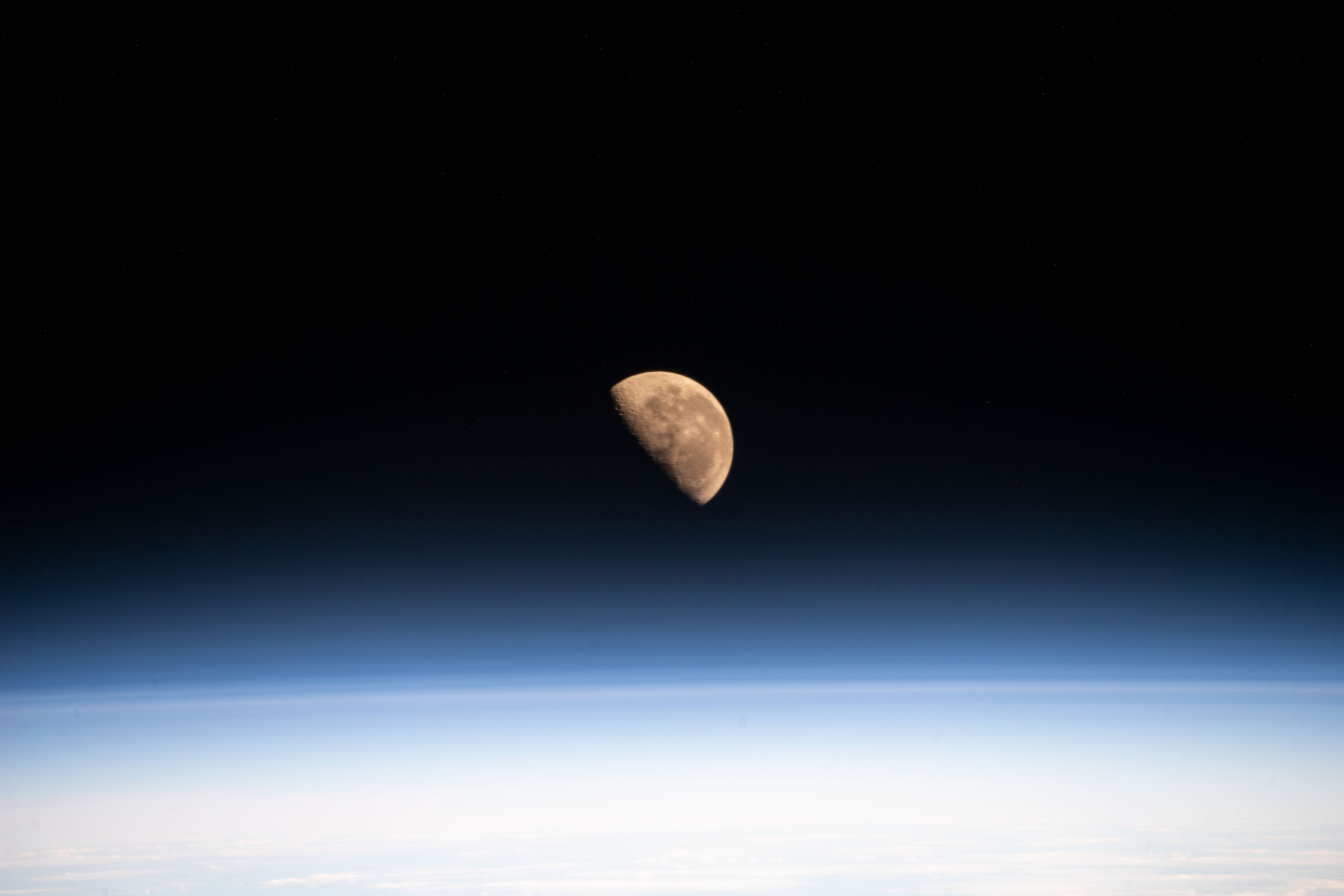 The Moon, pictured the day before going into its Last Quarter phase, is seen from the International Space Station as it orbited 266 miles above the Pacific Ocean northeast of New Zealand.