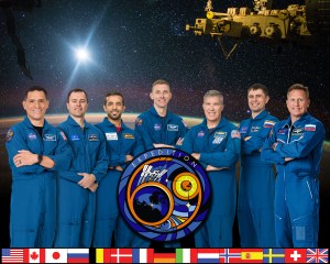 The official Expedition 69 crew portrait with (from left) flight engineers Frank Rubio from NASA, Dmitri Petelin from Roscosmos, Sultan Alneyadi from UAE (United Arab Emirates), Woody Hoburg from NASA, Stephen Bowen from NASA, Andrey Fedyaev from Roscosmos, and Commander Sergey Prokopyev from Roscosmos.