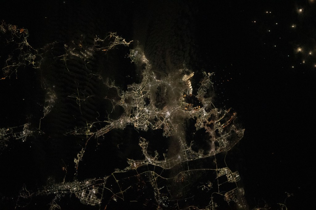 The port city of Busan, South Korea's second largest city with a population of over 3.4 million people, is pictured from the International Space Station as it orbited 258 miles above during an orbital night period.