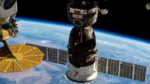 iss069e092250 (Sept. 25, 2023) --- The Soyuz MS-24 crew ship is pictured docked to the International Space Station's Rassvet module. The spacecraft launched three Expedition 69-70 crew members, NASA astronaut Loral O'Hara and Roscosmos cosmonauts Oleg Kononenko and Nikolai Chub, to the orbiting lab on Sept. 15, 2023. At left, is a portion of the Northrop Grumman Cygnus space freighter and one of its cymbal-shaped UltraFlex solar arrays.