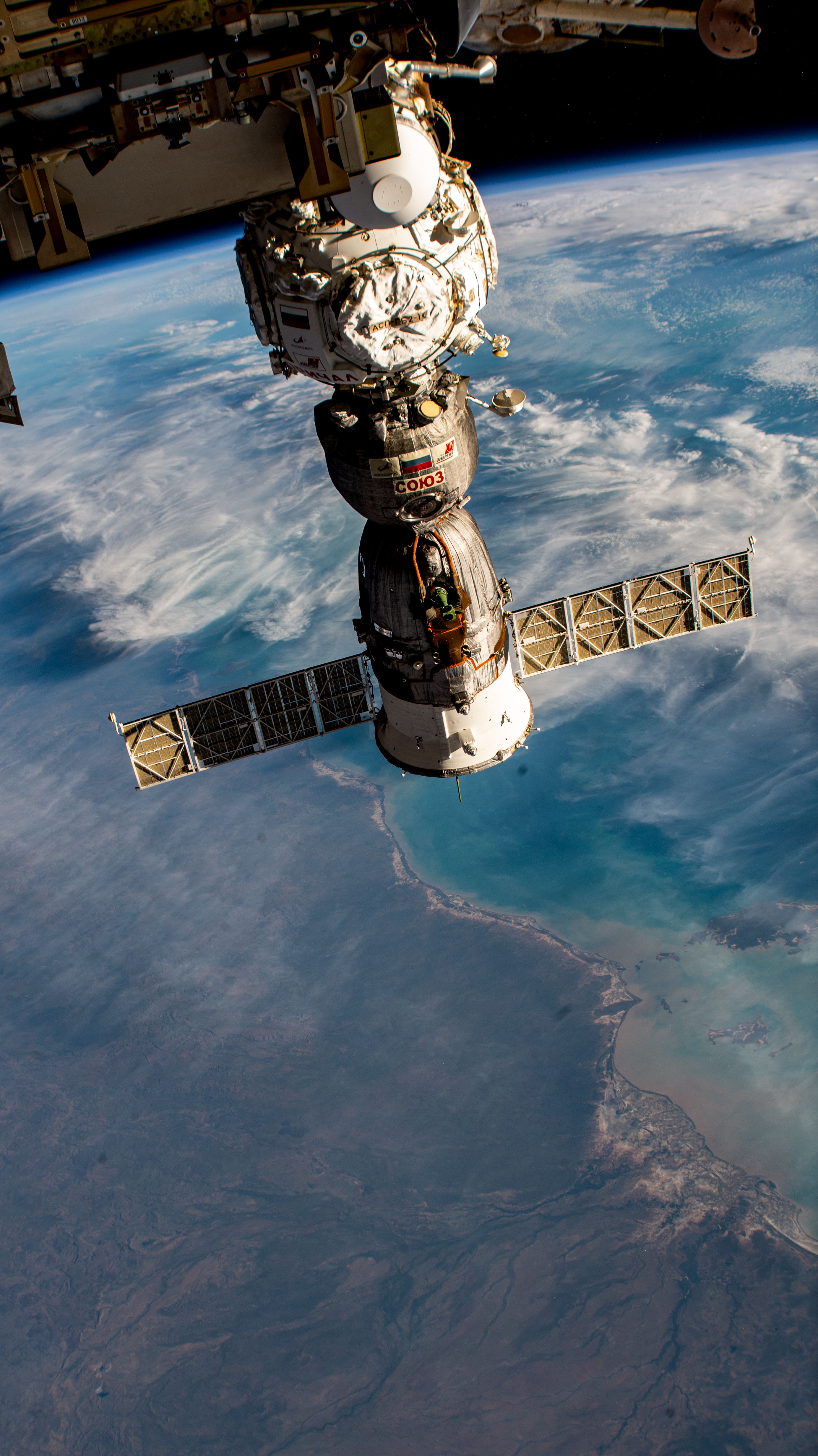 The Soyuz MS-23 crew ship is pictured docked to the Prichal docking module as the International Space Station orbited 264 miles above Queensland, Australia, near the coast of the Gulf of Carpentaria.