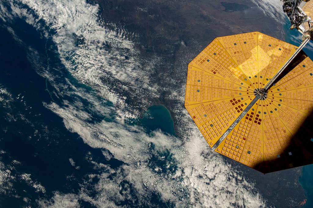 Soaring 262 miles over the Northeastern coast of Australia, ESA (European Space Agency) astronaut Andreas Mogensen captured this photo from the International Space Station. Northrop Grumman's Cygnus spacecraft, which has been docked to the station since Aug. 4, 2023, is positioned to the right of the image, displaying its prominent cymbal-shaped solar arrays.