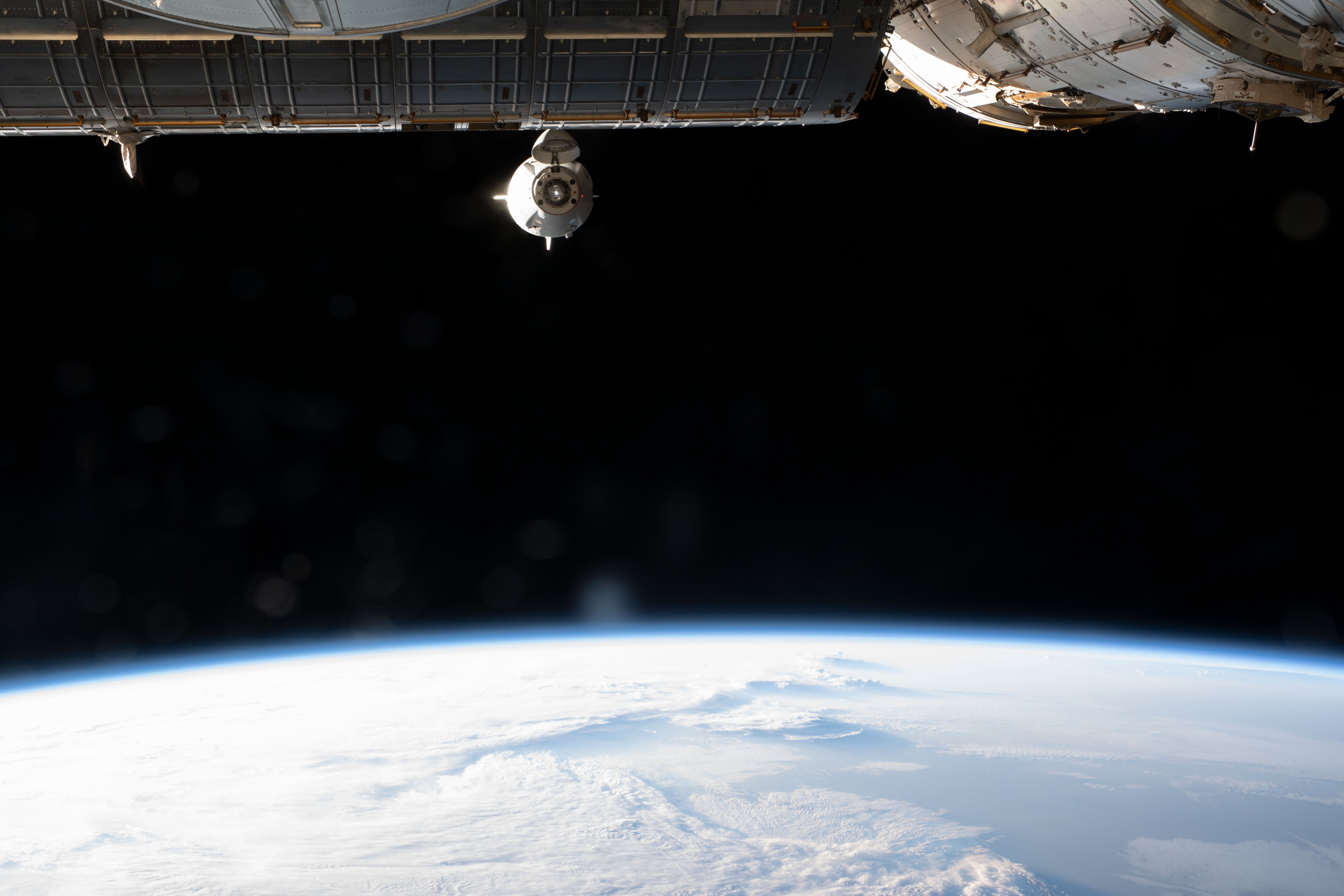 The SpaceX Crew Dragon Endeavour, with Expedition 69 crew members Steve Bowen and Woody Hoburg of NASA, UAE (United Arab Emirates) astronaut Sultan Alneyadi, and Roscosmos cosmonaut Andrey Fedyaev aboard, approaches the International Space Station for a docking to the Harmony module's forward port during a relocation maneuver 265 miles above the U.S-Canadian border.