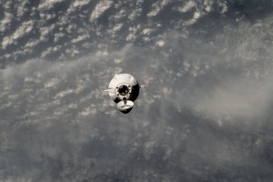 The SpaceX Dragon cargo craft approaches the International Space Station for an automated docking less than a day after launching from NASA's Kennedy Space Center loaded with over 7,000 pounds of science experiments, station hardware, and crew supplies. Both spacecraft were orbiting 259 miles above the Sea of Japan at the time of this photograph from the orbital outpost.