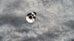 The SpaceX Dragon cargo vehicle approaches the International Space Station for an automated docking less than a day after launching from NASA's Kennedy Space Center loaded with over 7,000 pounds of science experiments, station hardware, and crew supplies. Both spacecraft were orbiting 260 miles above northern Mongolia at the time of this photograph from the orbital outpost.