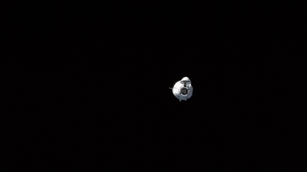 The SpaceX Freedom Dragon crew spacecraft with four Axiom Mission-2 private astronauts aboard is pictured approaching the International Space Station. Freedom, commanded by former NASA astronaut Peggy Whitson, with Pilot John Shoffner and Mission Specialists Ala Alqarni and Rayyanah Barnawi, docked to the Harmony module's space-facing port at 9:12 a.m. EDT on Monday beginning eight days of docked operations with the seven-member Expedition 69 crew.
