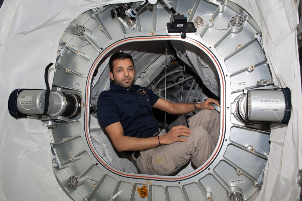 UAE (United Arab Emirates) astronaut and Expedition 69 Flight Engineer Sultan Alneyadi poses for a portrait inside the Bigelow Expandable Activity Module, or BEAM.