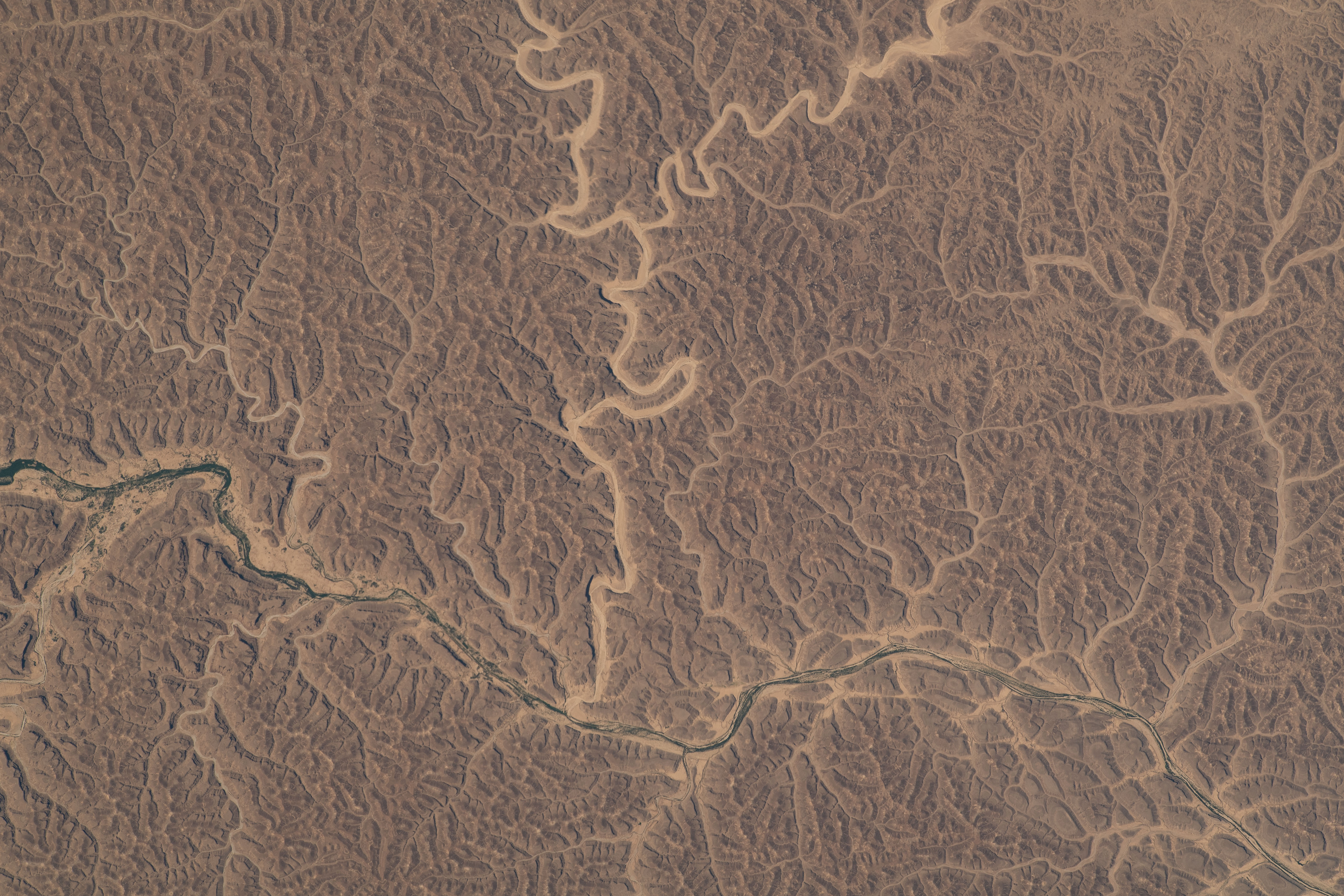 Wadis, the Arabic term for drainage courses that contain water only when intermittent, heavy rain occurs, in the hot desert climate of Yemen were pictured by NASA astronaut and Expedition 69 Flight Engineer Woody Hoburg as the International Space Station orbited 258 miles above.