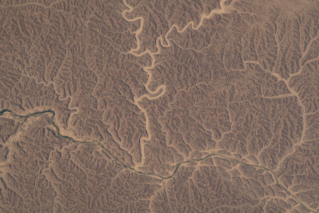 Wadis, the Arabic term for drainage courses that contain water only when intermittent, heavy rain occurs, in the hot desert climate of Yemen were pictured by NASA astronaut and Expedition 69 Flight Engineer Woody Hoburg as the International Space Station orbited 258 miles above.