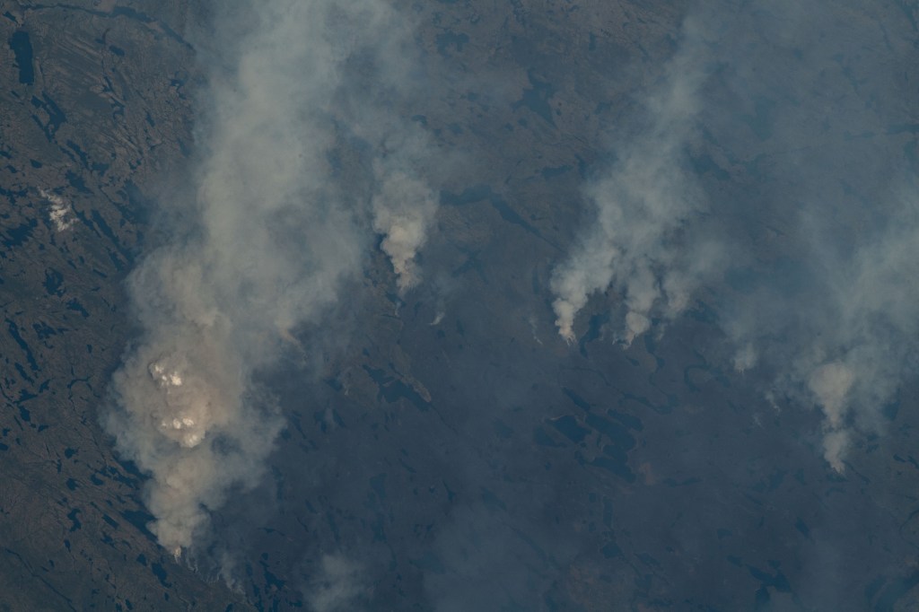 Wildfires in the Canadian province of Quebec are pictured from the International Space Station as it orbited 259 miles above.
