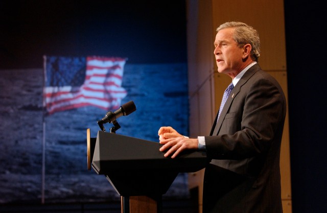 President George W. Bush speaks at a podium at NASA Headquarters