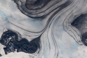 iss070e049061 (Dec. 27, 2023) -- As the International Space Station orbited 268 miles above the coast of Chile, snow drifts through glaciated mountain ranges in Southern Patagonia.