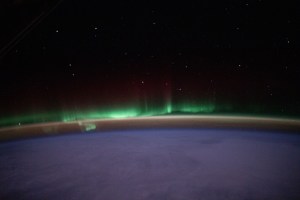 iss070e051526 (Jan. 1, 2024) -- An aurora shimmers in the night sky above Earth as the International Space Station soared 262 miles over Quebec.