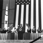 George H.W. Bush speaks on stage with the Apollo 11 astronauts at an event at the National Air and Space Museum.