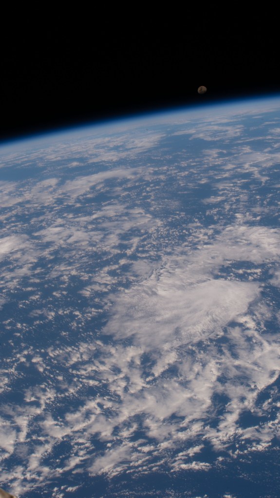 A waxing gibbous moon is pictured above the Earth's horizon as the International Space Station orbited above the Atlantic Ocean off the coast of Brazil.