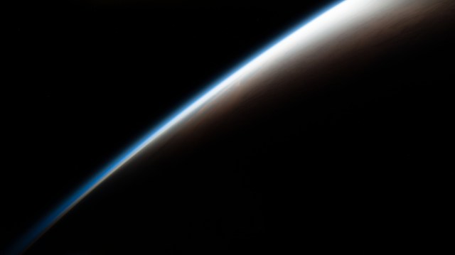 iss068e044995 (Feb. 1, 2023) --- An orbital sunrise begins illuminating Earth's atmosphere and its horizon in this photograph from the International Space Station as it orbited 268 miles above the south Atlantic Ocean off the coast of Argentina.