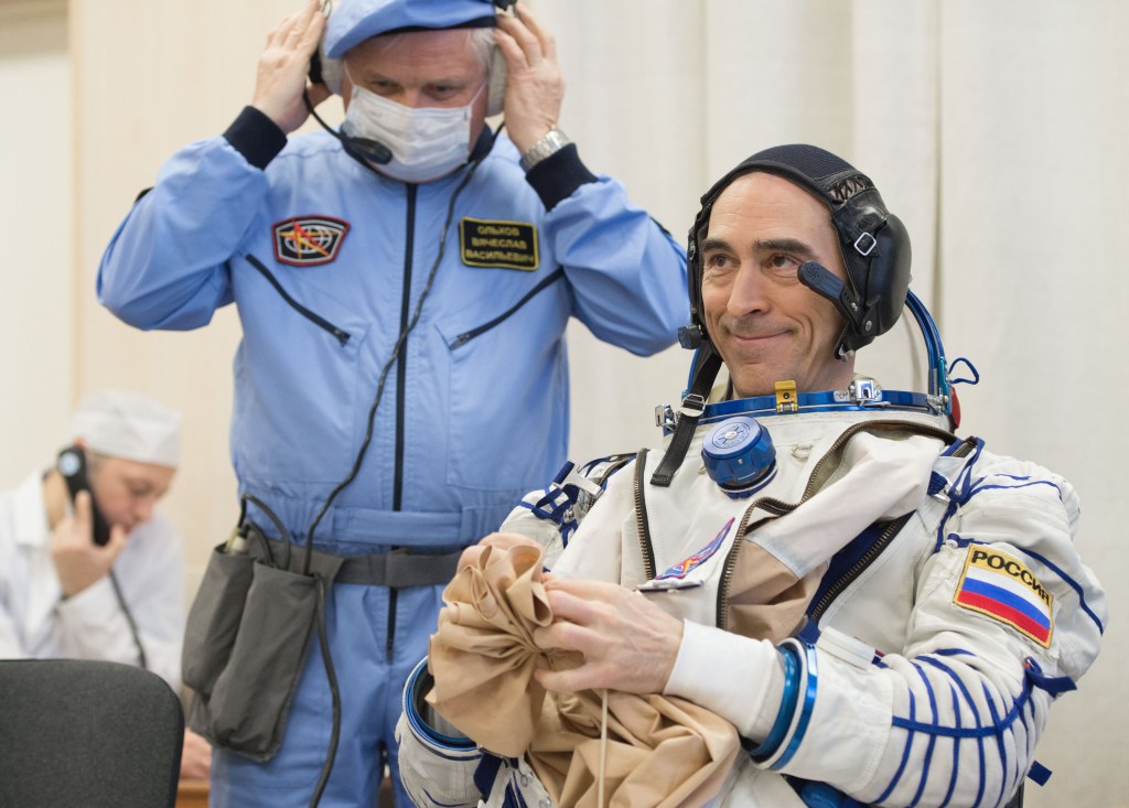 At the Baikonur Cosmodrome in Kazakhstan, Expedition 63 crewmember Anatoly Ivanishin of Roscosmos suits up March 25 for pre-launch training activities. Ivanishin, Ivan Vagner of Roscosmos and Chris Cassidy of NASA will launch April 9 on the Soyuz MS-16 spacecraft from Baikonur for a six-and-a-half month mission on the International Space Station. Credit: Andrey Shelepin/Gagarin Cosmonaut Training Center.