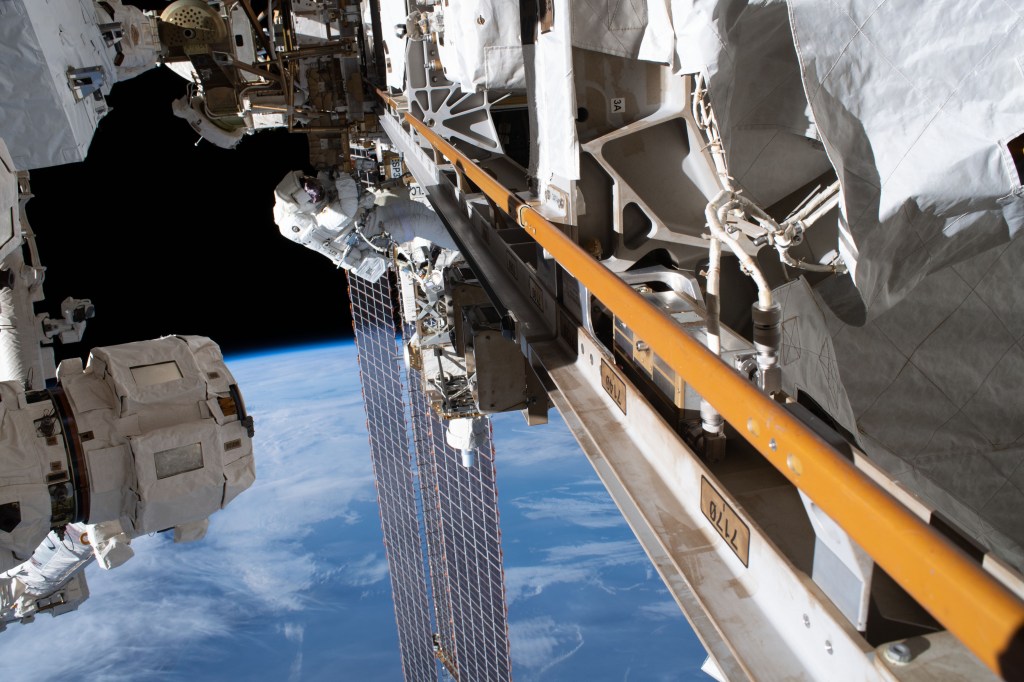 Astronaut Andrew Morgan of NASA is tethered to the Starboard-3 truss segment work site during the second spacewalk to repair the International Space Station's cosmic particle detector, the Alpha Magnetic Spectrometer.
