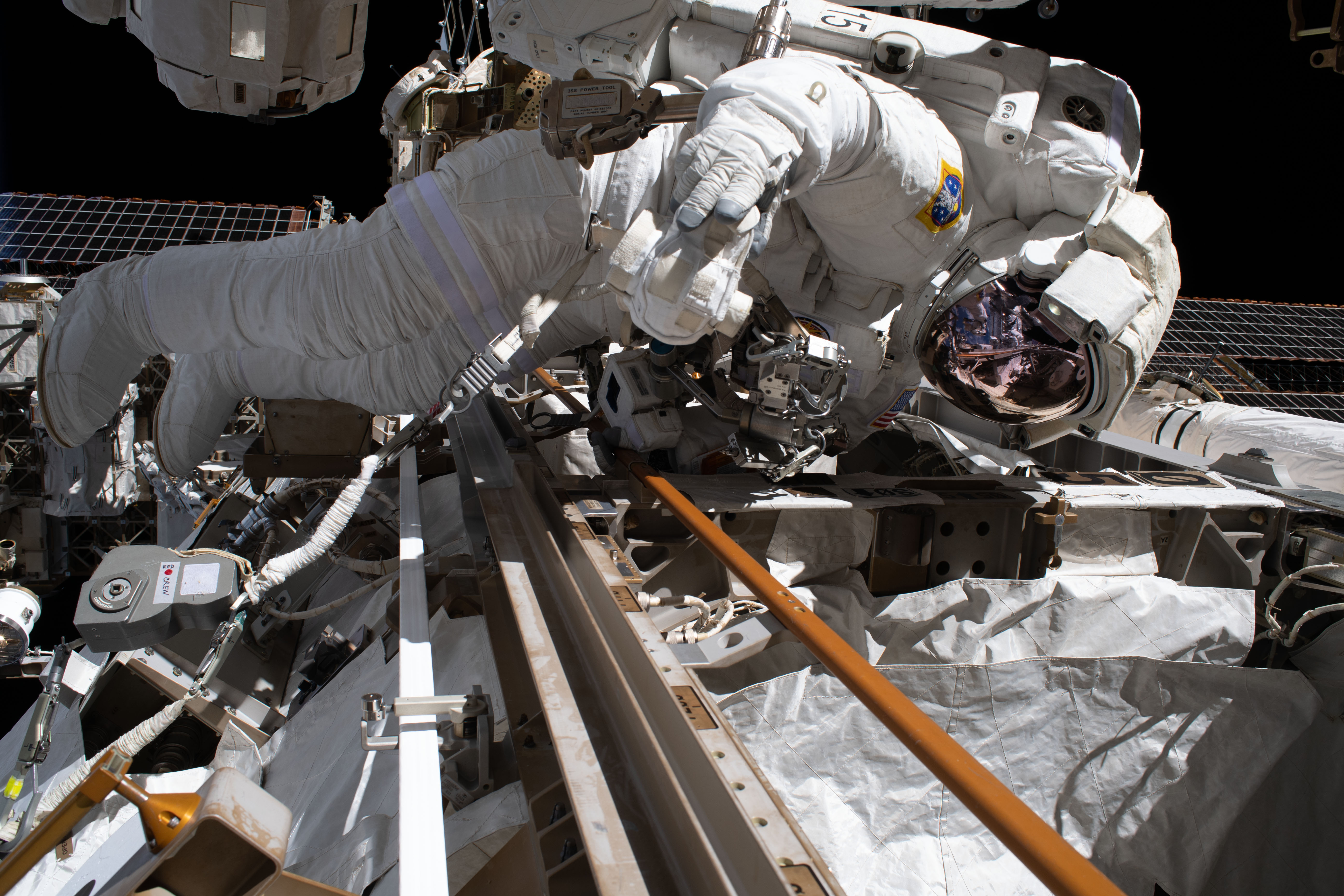 Astronaut Andrew Morgan of NASA is tethered to the Starboard-3 truss segment work site during the second spacewalk to repair the International Space Station's cosmic particle detector, the Alpha Magnetic Spectrometer.
