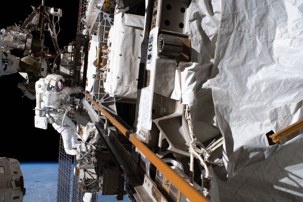 Astronaut Andrew Morgan of NASA is tethered to the Starboard-3 truss segment work site during the second spacewalk to repair the International Space Station's cosmic particle detector, the Alpha Magnetic Spectrometer.