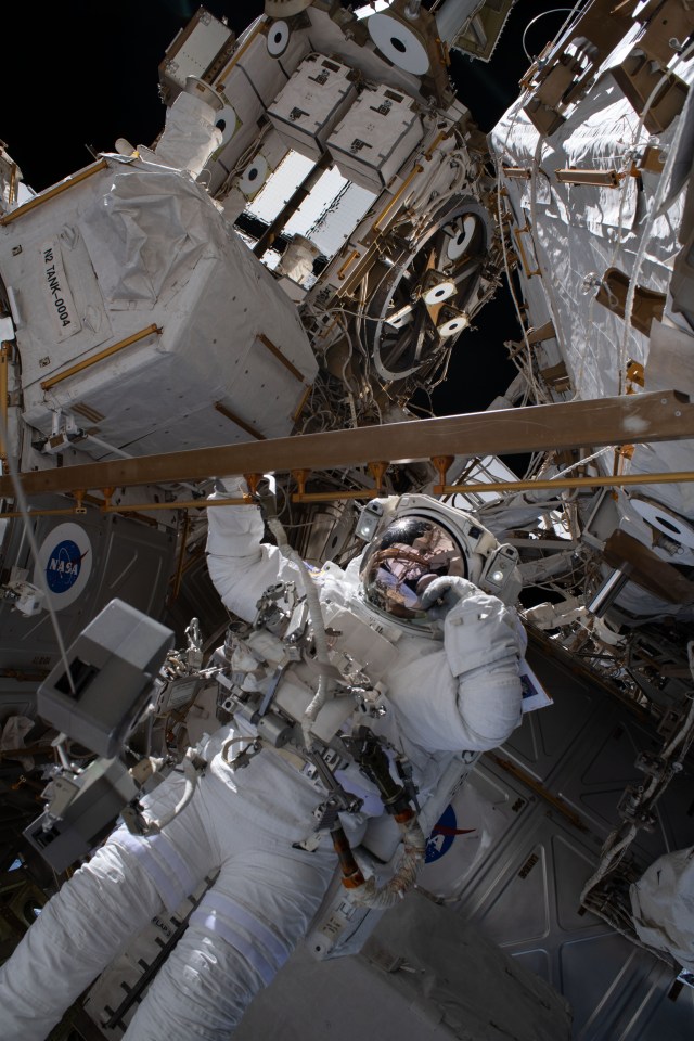 NASA astronaut and Expedition 63 Flight Engineer Bob Behnken works during a six-hour and one-minute spacewalk to swap an aging nickel-hydrogen battery for a new lithium-ion battery on the International Space Station's Starboard-6 truss structure.