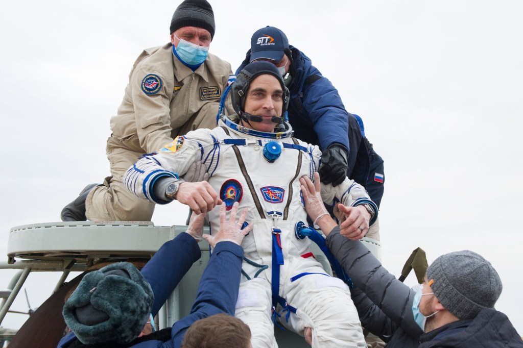 nhq202010220025 (Oct. 22, 2020) --- Expedition 63 NASA astronaut Chris Cassidy is helped out of the Soyuz MS-16 spacecraft just minutes after he and Roscosmos cosmonauts Anatoly Ivanishin, and Ivan Vagner, landed in a remote area near the town of Zhezkazgan, Kazakhstan on Thursday, October 22, 2020, Kazakh time (Oct. 21 Eastern time). Cassidy, Ivanishin and Vagner returned after 196 days in space having served as Expedition 62-63 crew members onboard the International Space Station.