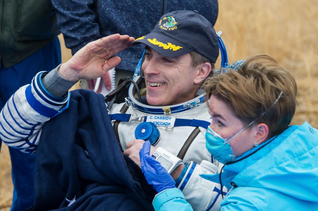 Expedition 63 NASA astronaut Chris Cassidy is seen outside the Soyuz MS-16 spacecraft after he landed with Roscosmos cosmonauts Ivan Vagner and Anatoly Ivanishin in a remote area near the town of Zhezkazgan, Kazakhstan on Thursday, October 22, 2020, Kazakh time (Oct. 21 Eastern time). Cassidy, Ivanishin and Vagner returned after 196 days in space having served as Expedition 62-63 crew members onboard the International Space Station.