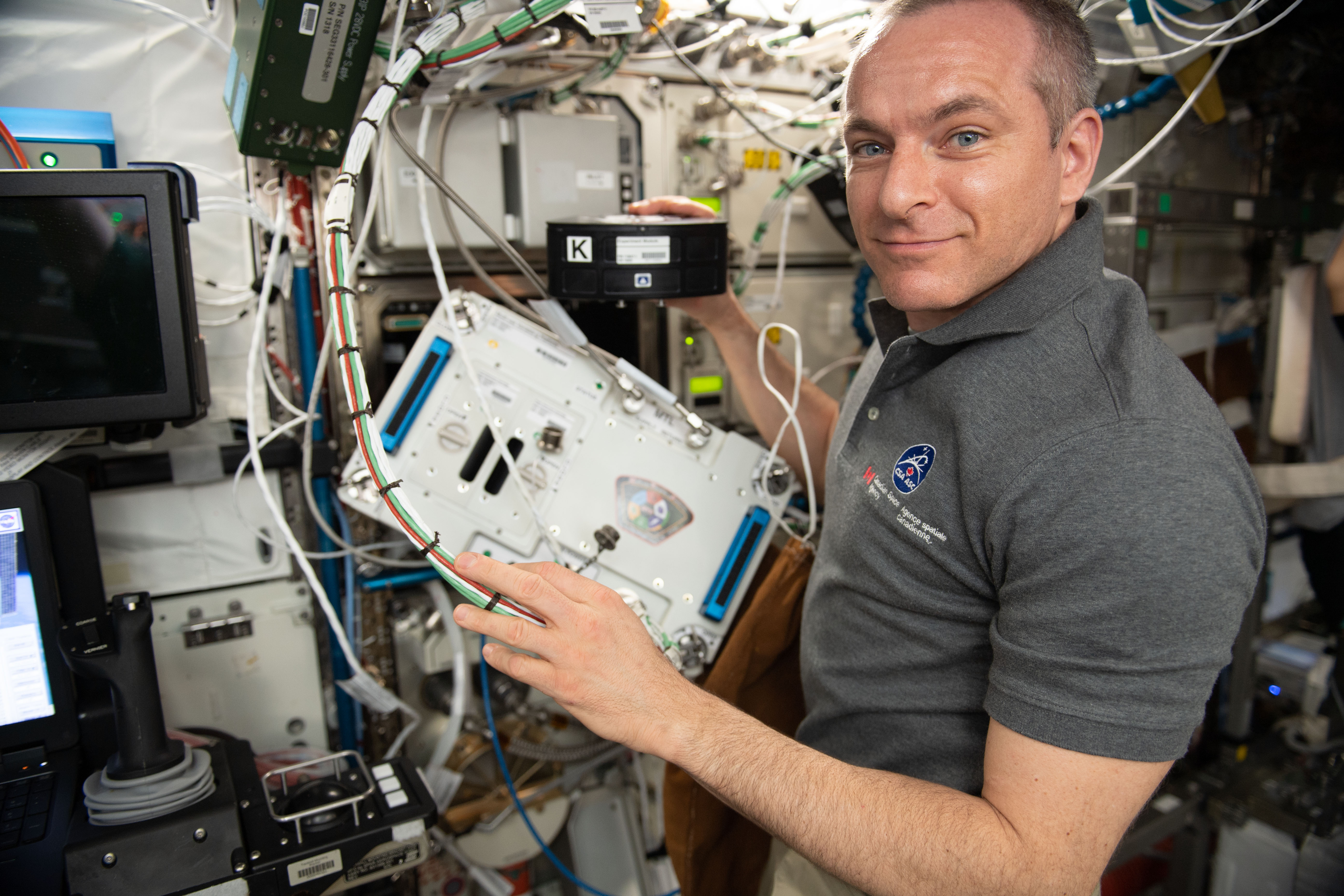 Canadian Space Agency astronaut David Saint-Jacques works with the Multi-purpose Variable-G Platform hardware exploring therapies for bone injuries...