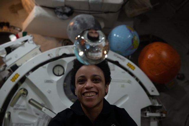 iss068e006271 (Oct. 1, 2022) --- NASA astronaut and Expedition 68 Flight Engineer Jessica Watkins has fun with fluid physics as she observes the behavior of a free-flying water bubble inside the International Space Station's Kibo laboratory module.