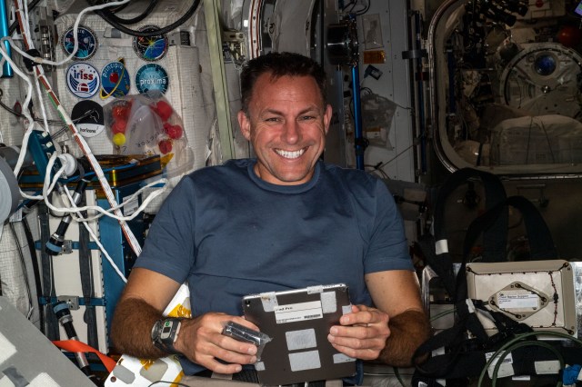 iss068e017521 (Oct. 18, 2022) --- NASA astronaut and Expedition 68 Flight Engineer Josh Cassada is pictured inside the Columbus laboratory module familiarizing himself with research hardware aboard the International Space Station. Credit: NASA/Frank Rubio
