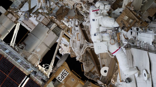 iss068e026407 (Dec. 3, 2022) --- NASA astronaut and Expedition 68 Flight Engineer Josh Cassada is pictured tethered to the International Space Station during a spacewalk to install a roll-out solar array on the Starboard-4 truss segment.