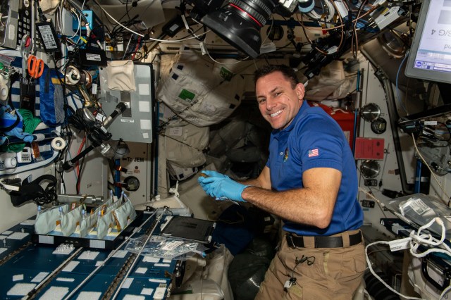 iss068e036904 (Jan. 4, 2022) --- NASA astronaut and Expedition 68 Flight Engineer Josh Cassada works in the International Space Station's Harmony module on the BioNutrients-2 investigation that uses genetically engineered microbes to provide nutrients, and potentially other compounds and pharmaceuticals, on demand in space.