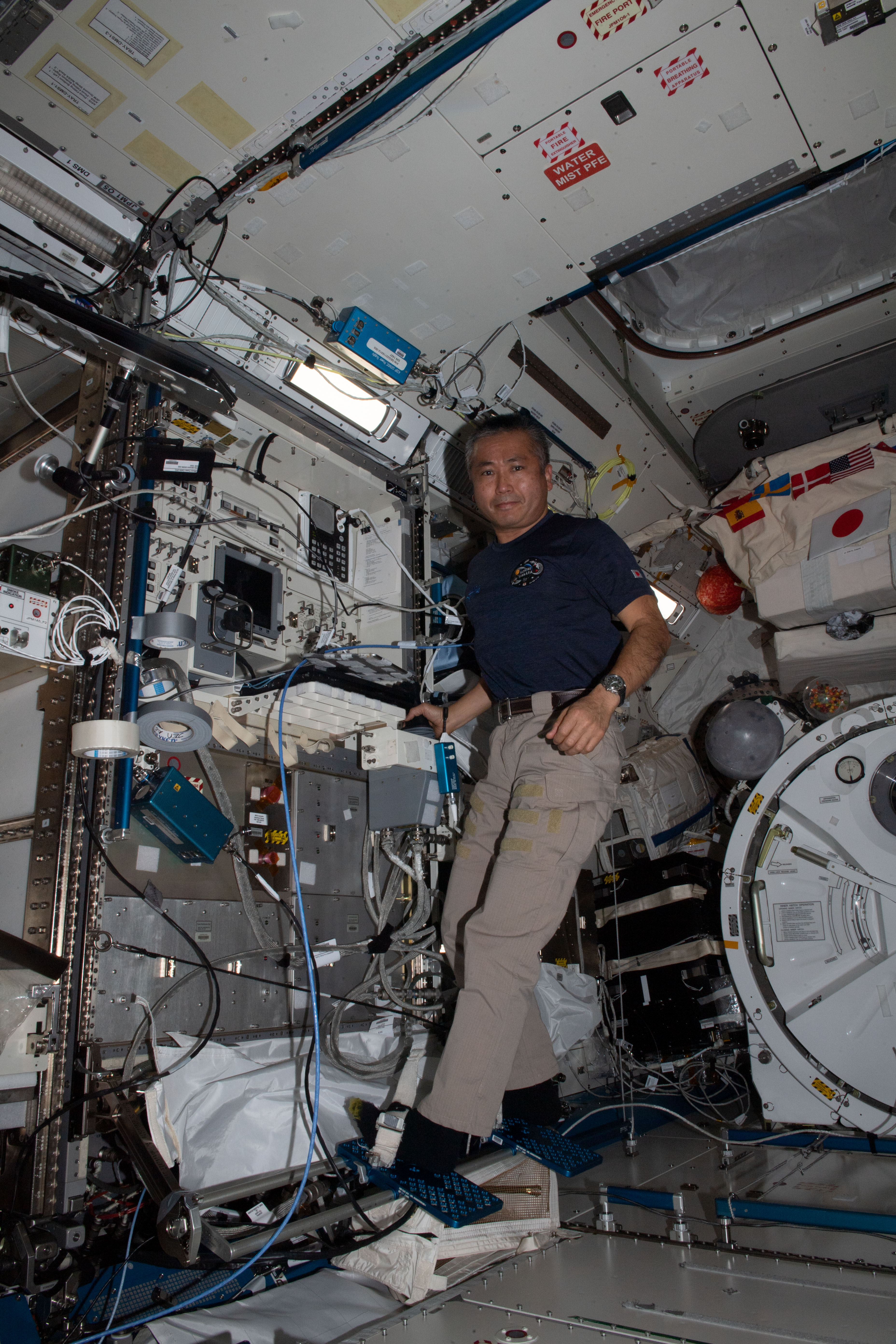 iss068e017746 (Oct. 21, 2022) --- Expedition 68 Flight Engineer Koichi Wakata of the Japan Aerospace Exploration Agency (JAXA) checks out the robotics console and its interfaces that control the Japanese robotic arm attached to the Kibo laboratory module. The robotic manipulator system maneuvers scientific payloads in and out of Kibo's airlock to the Exposed Facility for external research operations.