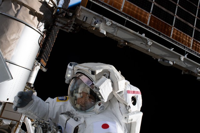 iss068e041240 (Jan. 20, 2022) --- Expedition 68 Flight Engineer Koichi Wakata of the Japan Aerospace Exploration Agency (JAXA) is pictured in his Extravehicular Mobility Unit (EMU), or spacesuit, during a seven-hour and 21-minute spacewalk to install a modification kit on the International Space Station's starboard truss structure preparing the orbital lab for its next roll-out solar array.