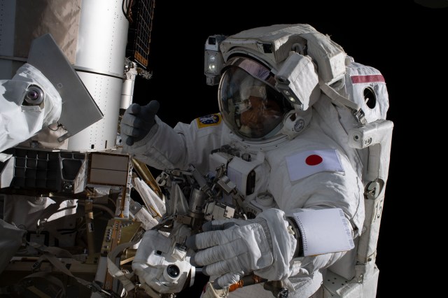 iss068e041238 (Jan. 20, 2022) --- Expedition 68 Flight Engineer Koichi Wakata of the Japan Aerospace Exploration Agency (JAXA) is pictured in his Extravehicular Mobility Unit (EMU), or spacesuit, during a seven-hour and 21-minute spacewalk to install a modification kit on the International Space Station's starboard truss structure preparing the orbital lab for its next roll-out solar array.