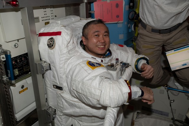 iss068e041418 (Jan. 20, 2022) --- Expedition 68 Flight Engineer Koichi Wakata of the Japan Aerospace Exploration Agency (JAXA) is pictured in his Extravehicular Mobility Unit (EMU), or spacesuit, after finishing a seven-hour and 21-minute spacewalk installing a modification kit on the International Space Station's starboard truss structure preparing the orbital lab for its next roll-out solar array.