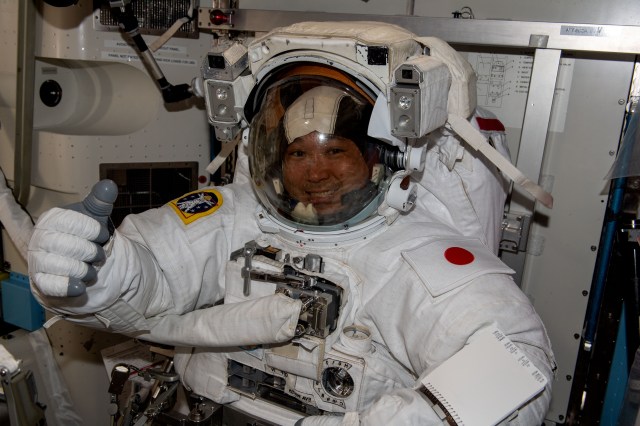 iss068e040062 (Jan. 12, 2023) --- Expedition 68 Flight Engineer Koichi Wakata of the Japan Aerospace Exploration Agency (JAXA) is pictured during a fit check of his Extravehicular Mobility Unit (EMU), or spacesuit, ahead of a planned spacewalk to upgrade the International Space Station's power generation system.