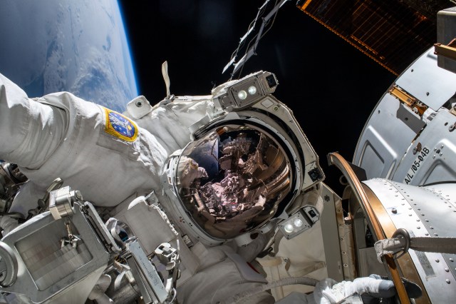 iss068e045166 (Feb. 2, 2023) --- Expedition 68 Flight Engineer Koichi Wakata of the Japan Aerospace Exploration Agency (JAXA) is pictured in his Extravehicular Mobility Unit, or spacesuit, during his second spacewalk. He and fellow spacewalker Nicole Mann (out of frame) of NASA installed a modification kit on the International Space Station's starboard truss structure that will enable the future installation of the orbiting lab's next roll-out solar array.
