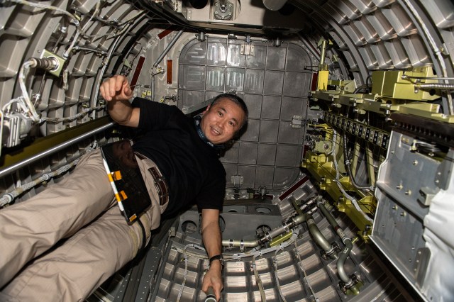 iss068e036934 (Jan. 4, 2022) --- Expedition 68 Flight Engineer Koichi Wakata of the Japan Aerospace Exploration Agency (JAXA) is pictured inside the Kibo laboratory module's airlock where external payloads such as science experiments and nanosatellites are placed into the outer space environment.