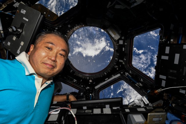 iss068e025356 (Nov. 27, 2022) --- Expedition 68 Flight Engineer Koichi Wakata of the Japan Aerospace Exploration Agency (JAXA) is pictured inside the seven-window cupola as the SpaceX Dragon cargo craft approaches the International Space Station for a docking.