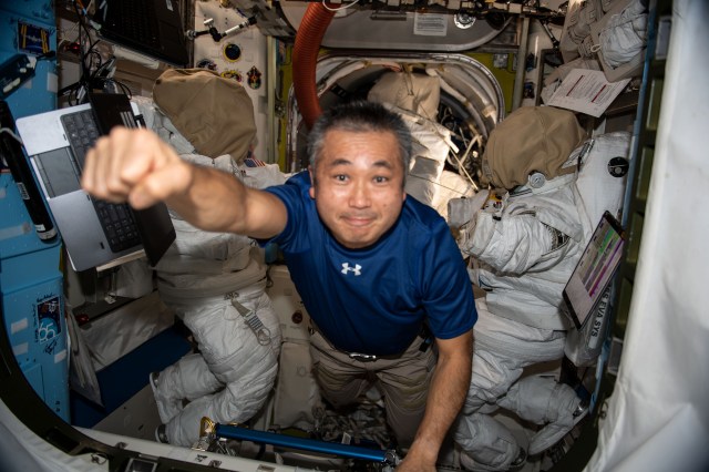iss068e021041 (Nov. 7, 2022) --- Astronaut and Expedition 68 Flight Engineer Koichi Wakata of the Japan Aerospace Exploration Agency (JAXA) is pictured inside the International Space Station's Quest airlock where spacewalks in NASA's Extravehicular Mobility Units (EMUs), or spacesuits, are staged. Credit: Koichi Wakata/JAXA