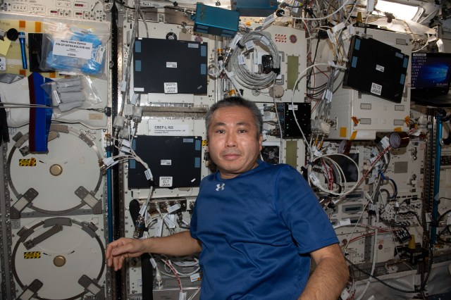 iss068e021206 (Nov. 9, 2022) --- Expedition 68 Flight Engineer Koichi Wakata of the Japan Aerospace Exploration Agency (JAXA) works inside the International Space Station's Kibo laboratory module connecting cables and reconfiguring sensors on the Cell Biology Experiment Facility, a research incubator with an artificial gravity generator.