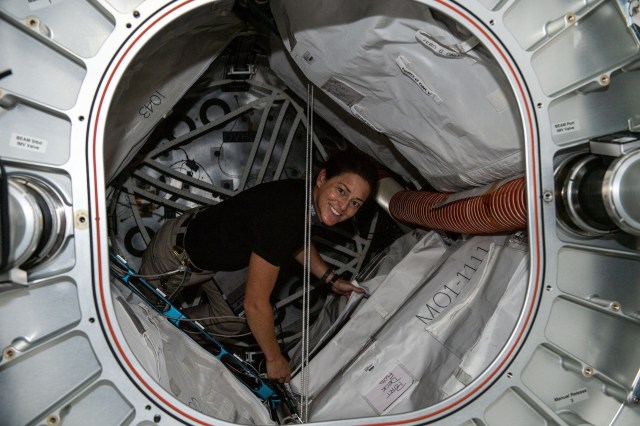 iss068e017323 (Oct. 17, 2022) --- NASA astronaut and Expedition 68 Flight Engineer Nicole Mann poses inside BEAM, the Bigelow Expandable Activity Module, during cargo activities aboard the International Space Station.