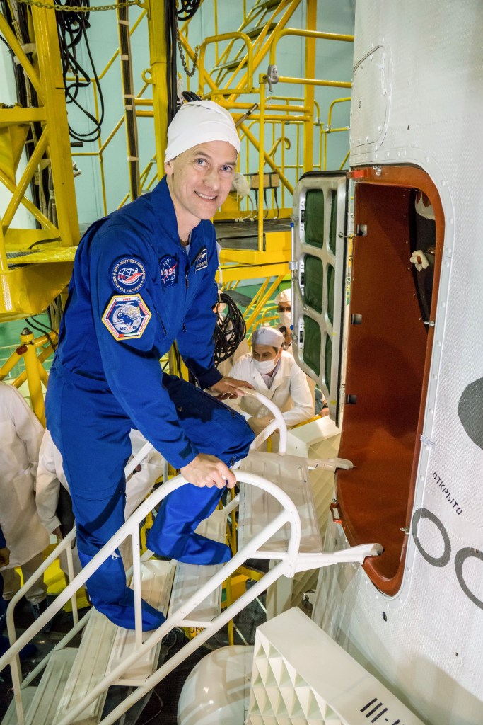 At the Baikonur Cosmodrome in Kazakhstan, backup Expedition 61 crewmember Tom Marshburn of NASA poses for pictures Sept. 20 as he prepares to inspect the Soyuz MS-15 spacecraft in a final fit check activity. Marshburn, backup spaceflight participant Sultan Al-Neyadi of the United Arab Emirates and backup Expedition 61 crewmember Sergey Ryzhikov of Roscosmos are the backups to the prime crew, Hazzaa Ali Almansoori of the United Arab Emirates, Oleg Skripochka of Roscosmos and Jessica Meir of NASA, who will launch Sept. 25 on the Soyuz MS-15 spacecraft for a mission on the International Space Station.