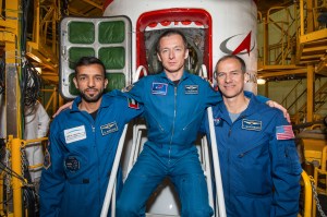 At the Baikonur Cosmodrome in Kazakhstan, the backups to the next crew to launch to the International Space Station pose for pictures Sept. 20 in front of the Soyuz MS-15 spacecraft. From left to right are backup spaceflight participant Sultan Al-Neyadi of the United Arab Emirates and backup Expedition 61 crewmembers Sergey Ryzhikov of Roscosmos and Tom Marshburn of NASA. They are the backups to the prime crew, Hazzaa Ali Almansoori of the United Arab Emirates, Oleg Skripochka of Roscosmos and Jessica Meir of NASA, who will launch Sept. 25 on the Soyuz MS-15 spacecraft for a mission on the International Space Station.