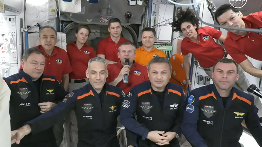 The four Axiom Mission 3 astronauts (front row) gather with the Expedition 70 crew inside the International Space Station's Harmony module. Credit: NASA TV