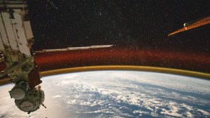 This high exposure photograph from the International Space Station shows Earth's atmospheric glow and a starry sky as the orbital complex soared above the Pacific Ocean.