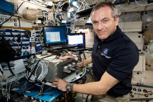 Canadian Space Agency astronaut David Saint-Jacques works inside the Harmony module testing and installing electronics hardware.