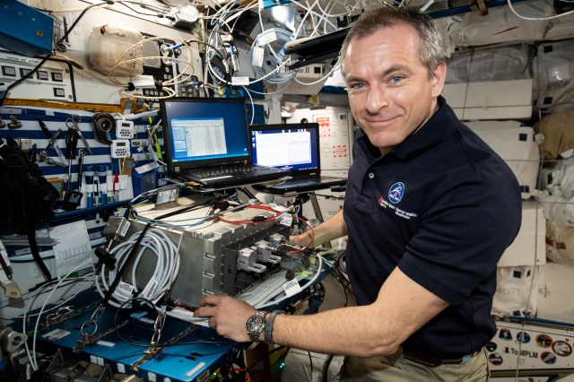Canadian Space Agency astronaut David Saint-Jacques works inside the Harmony module testing and installing electronics hardware.